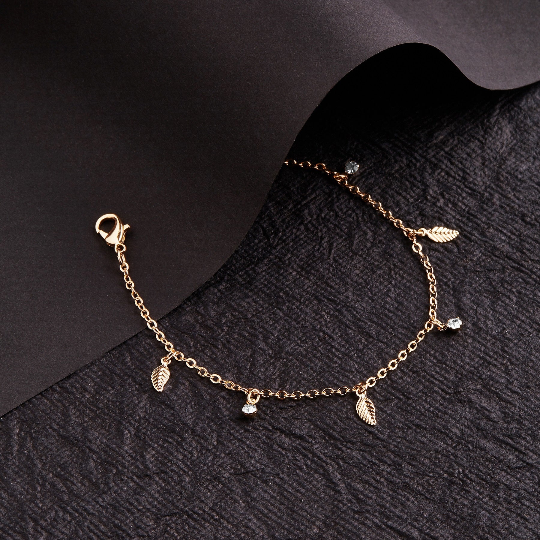 Accessorize London Women's Gold Feather Charms Bracelet