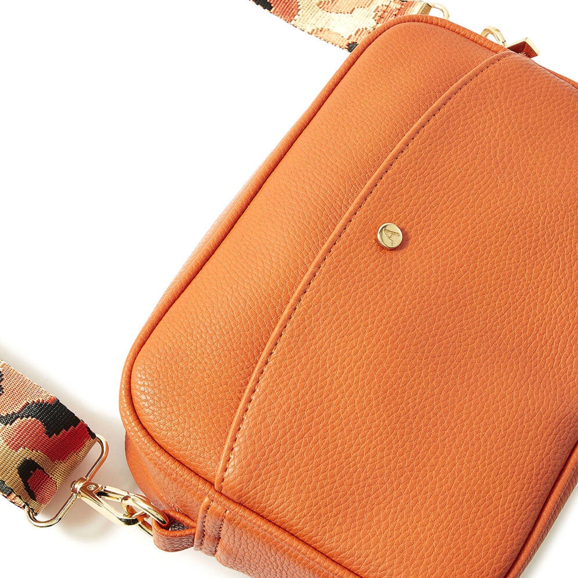 Accessorize London Women's Faux Leather Orange Leopard strap camera Sling bag