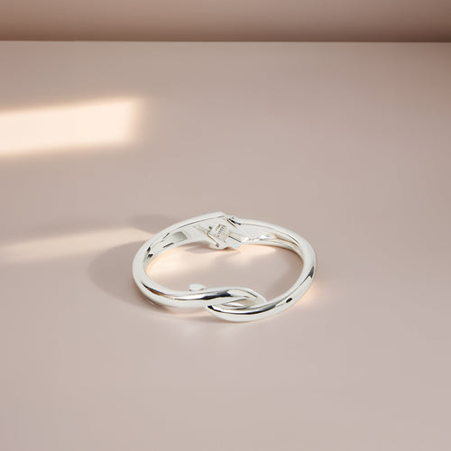 Twist Knot Hinge Bangle Silver