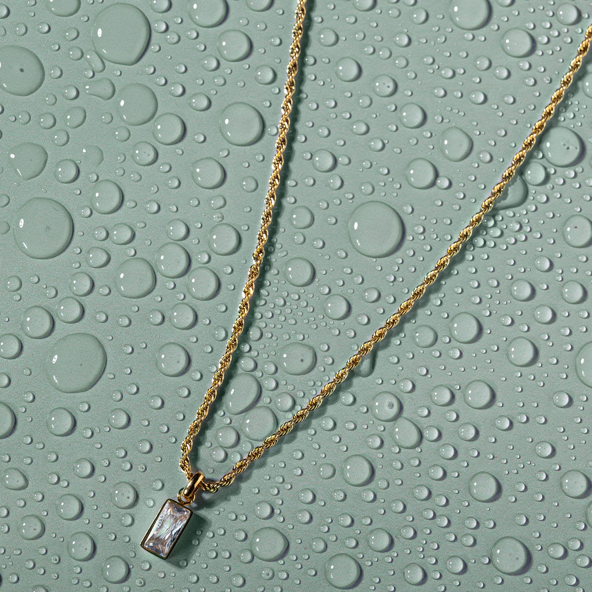 Accessorize London Women's Water Proof Gold Stainless Steel Twisted Chain Emerald Cut Pendant Necklace