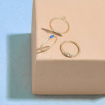 Accessorize London Women's Set of 3 Gold & Blue Baguette Ring Small