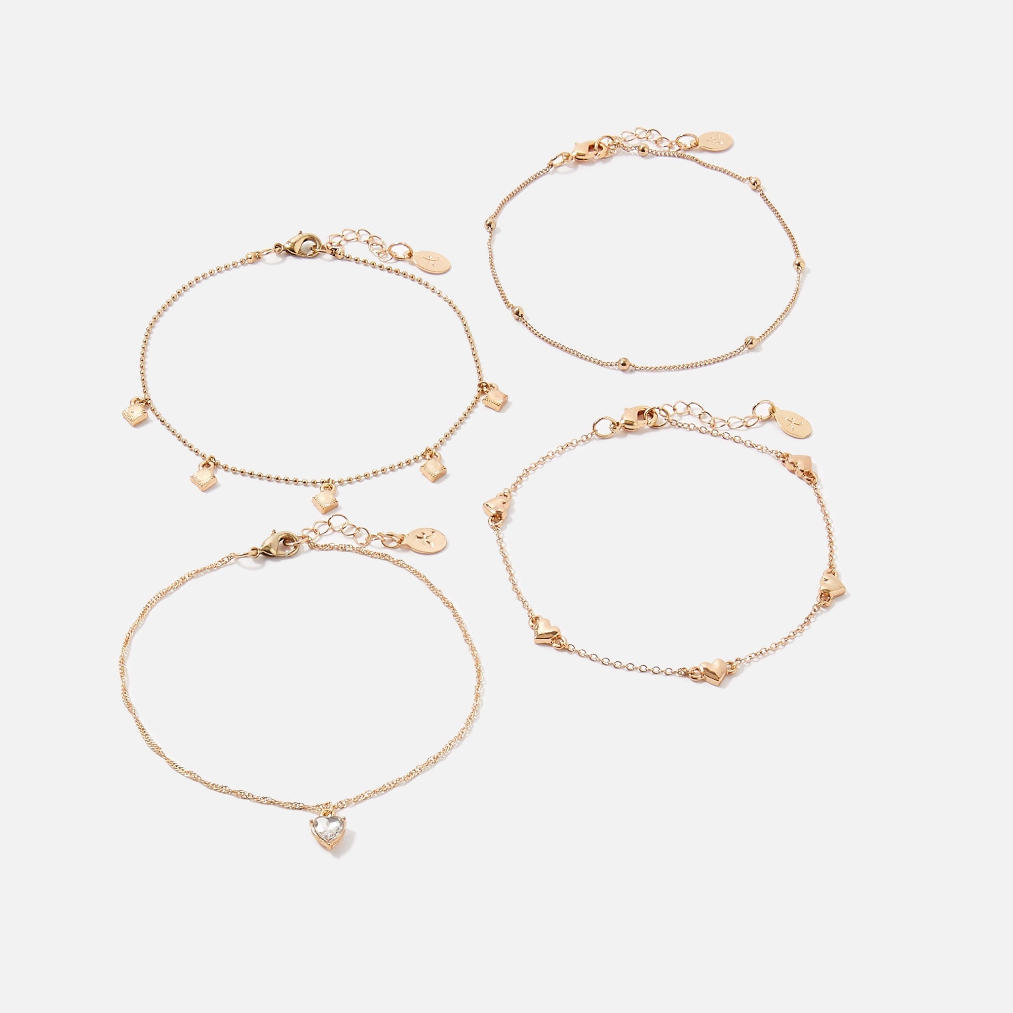 Accessorize London Women's Gold pack of 4 Hearts Anklet Pack Jewellery - Accessorize India