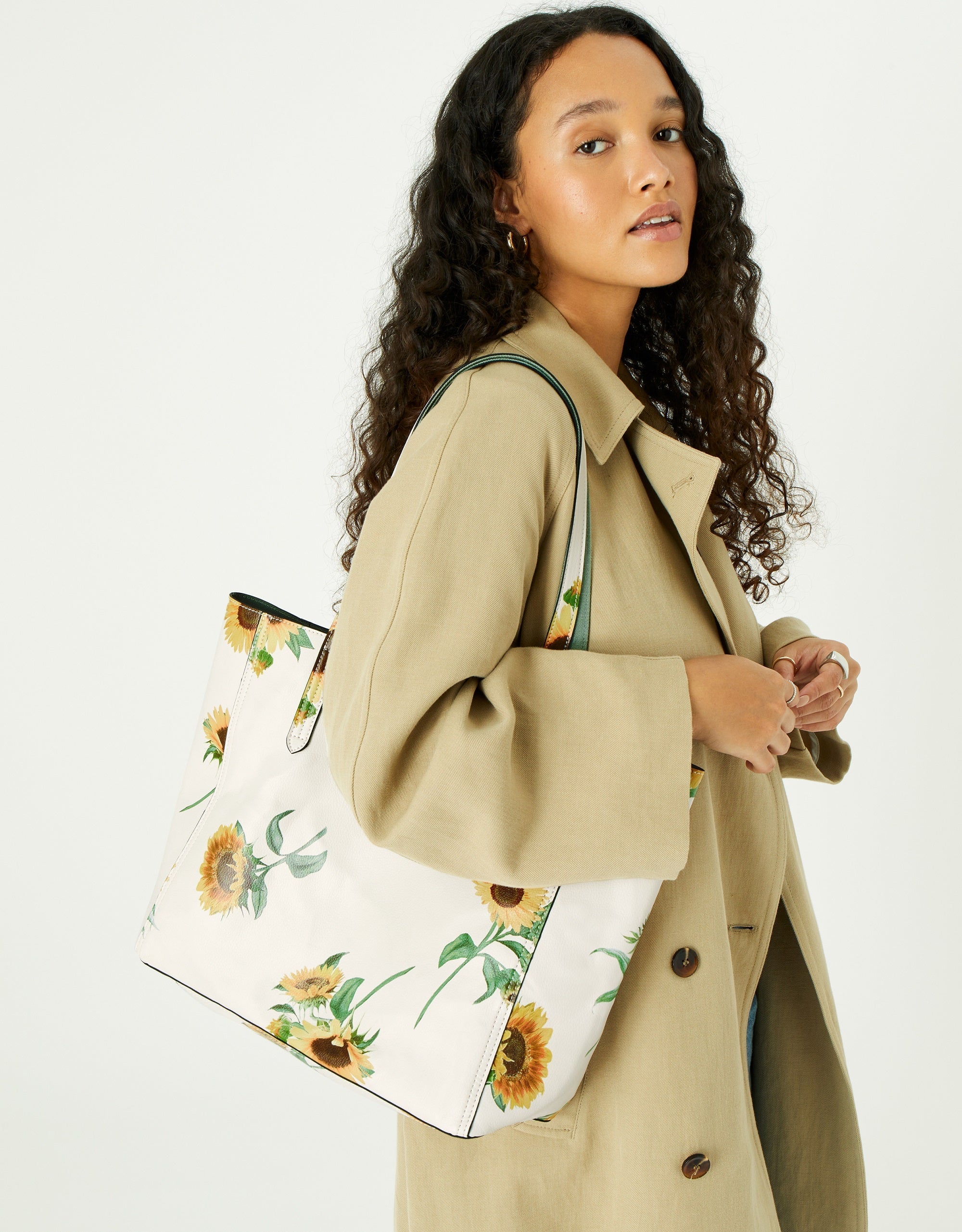 Accessorize London women's Faux Leather Sunflower Print Reversible Tot