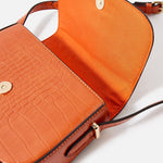 Accessorize London women's Faux Leather Orange Ruby Croc Sling bag