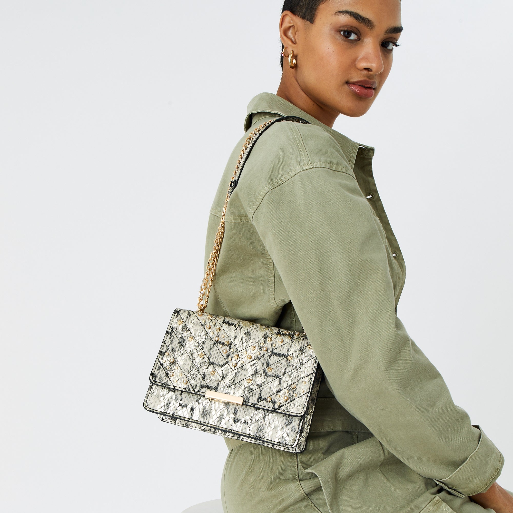 Accessorize London women's Faux Leather Multi Studded Shoulder Sling bag