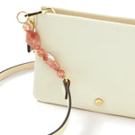 Accessorize London women's Faux Leather Pink Beaded Strap Sling bag