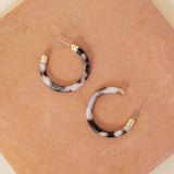Accessorize London Women's Black Resin tube hoop earrings
