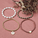 Accessorize London Women's Multi Willow Pack of 4 Charms Stretch Bracelets
