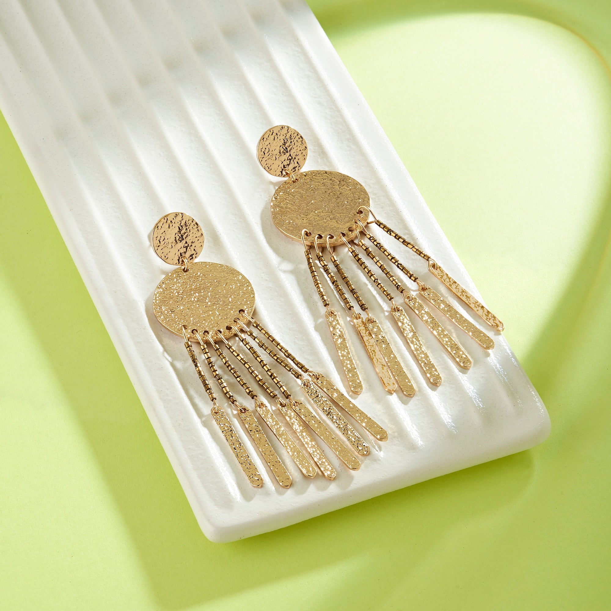 Tassel Earrings Gold Textured Statement Earrings Buy Gold Textured Tassel Statement Earring Accessorize India