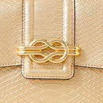 Accessorize London Women's Faux Leather Gold Snaffle detail faux croc Sling Bag