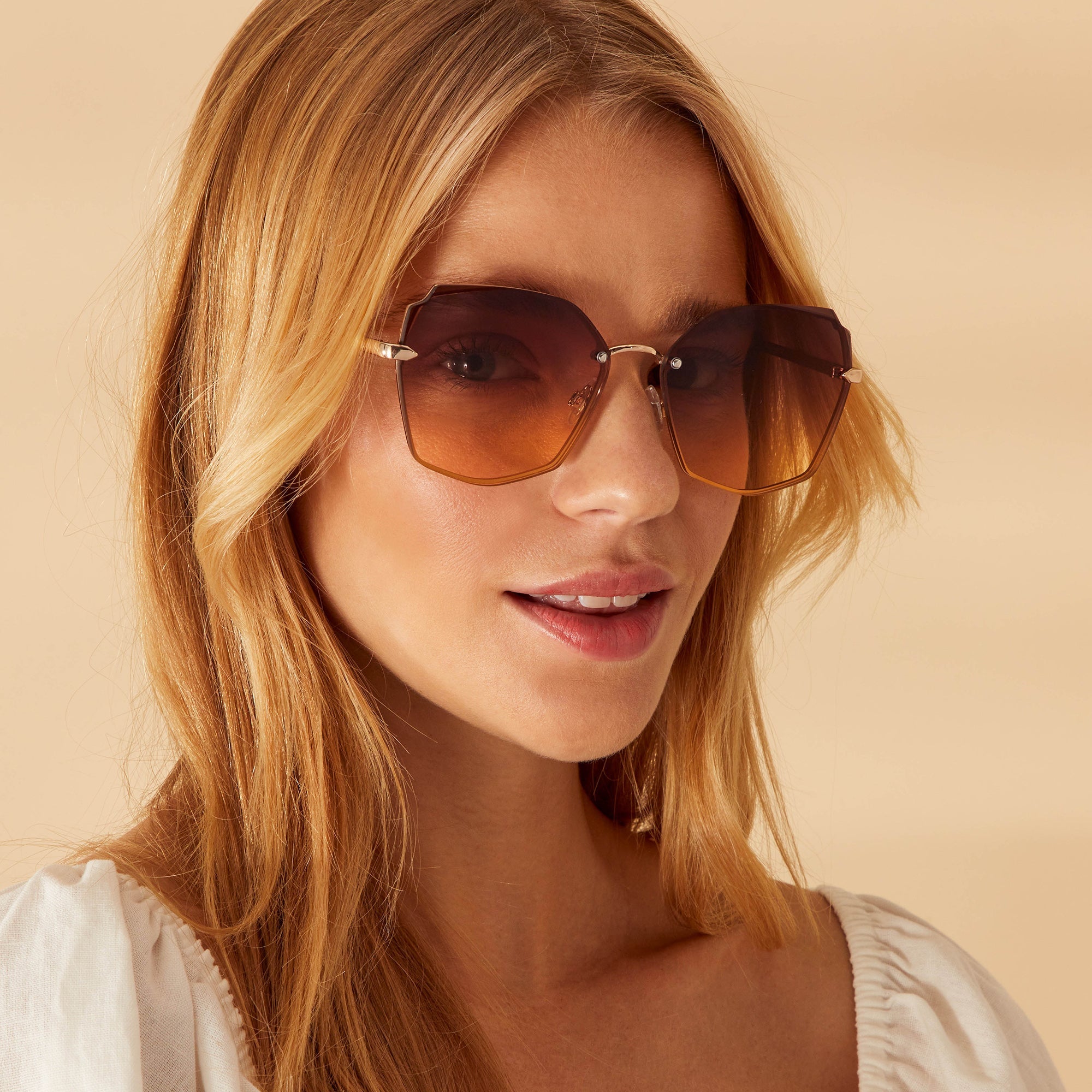 Accessorize London Women's Gold Shaped Rimless Sunglasses