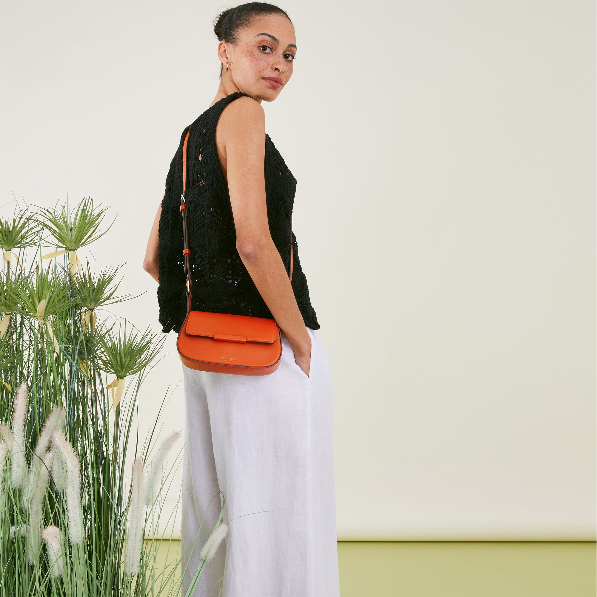 Accessorize London Women's Faux Leather Orange Small Saddle Sling Bag